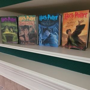 4 Harry Potter bOOKS. All are used with covers.